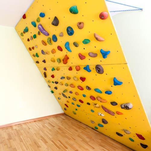 Adjustable angle climbing wall